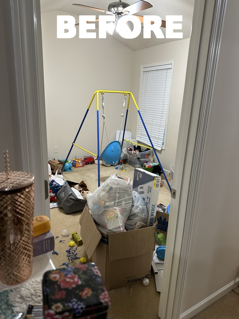 Before - room packed with kids toys swing set boxes